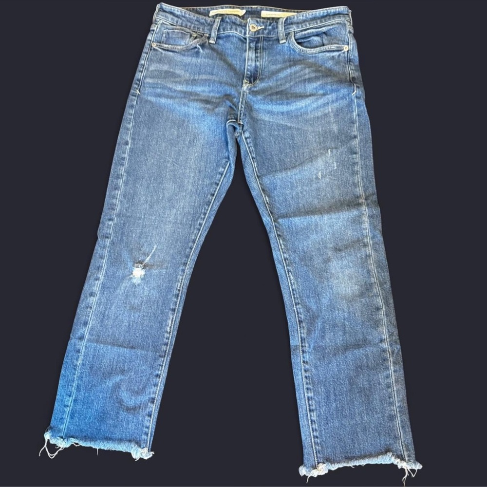 Pilcro and the Letterpress Anthropologie brand Jeans Classic Blue distressed hem